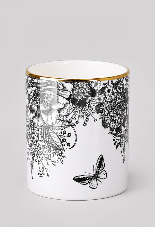 Back view of monochrome botanical vase displaying detailed ink drawn flowers