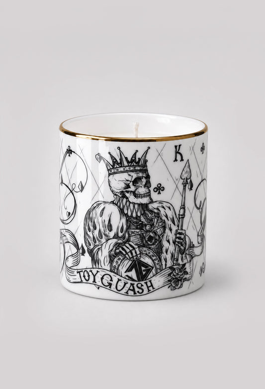 Amber and Tonka scented candle in a white fine bone china vessel with a 22ct gold rim
