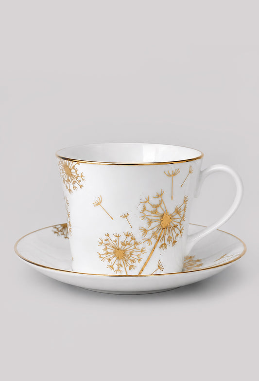 Large dandelion fine bone china cup and saucer decorated in 22ct gold on a light grey background