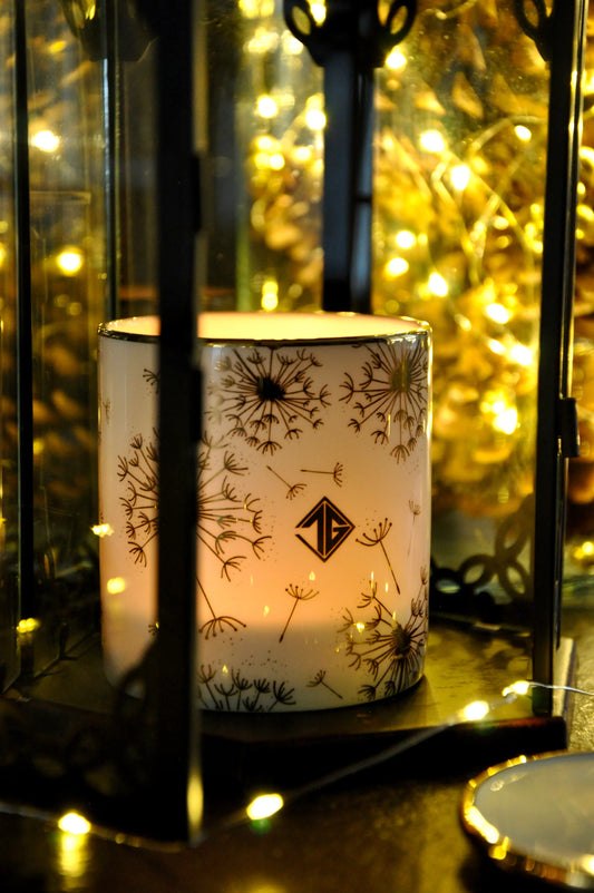 Lit Frankincense & Myrrh candle glowing through a fine bone china Dandelion vessel