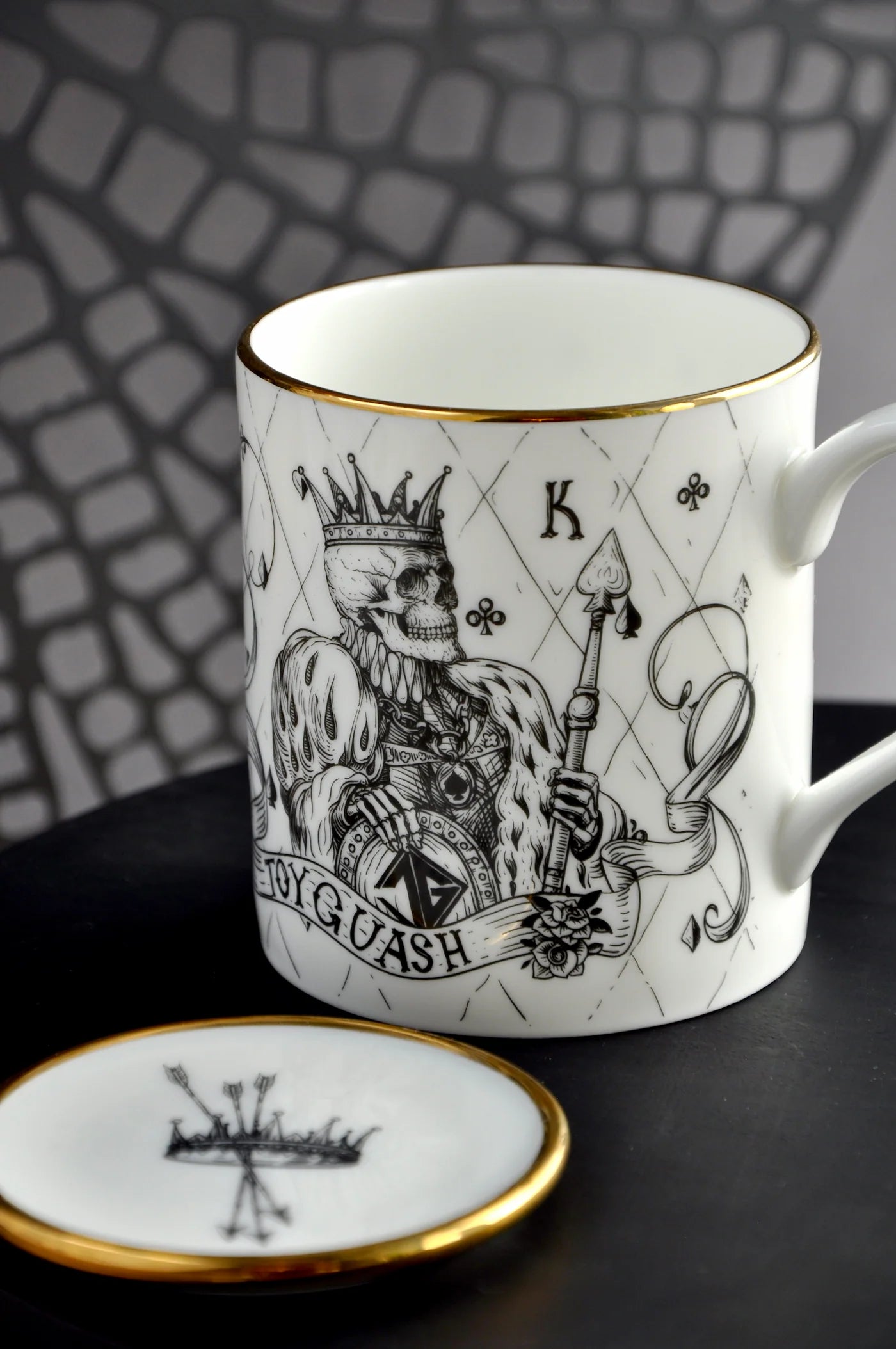 Illustrated fine bone china tea mug shown alongside matching mini treat plate