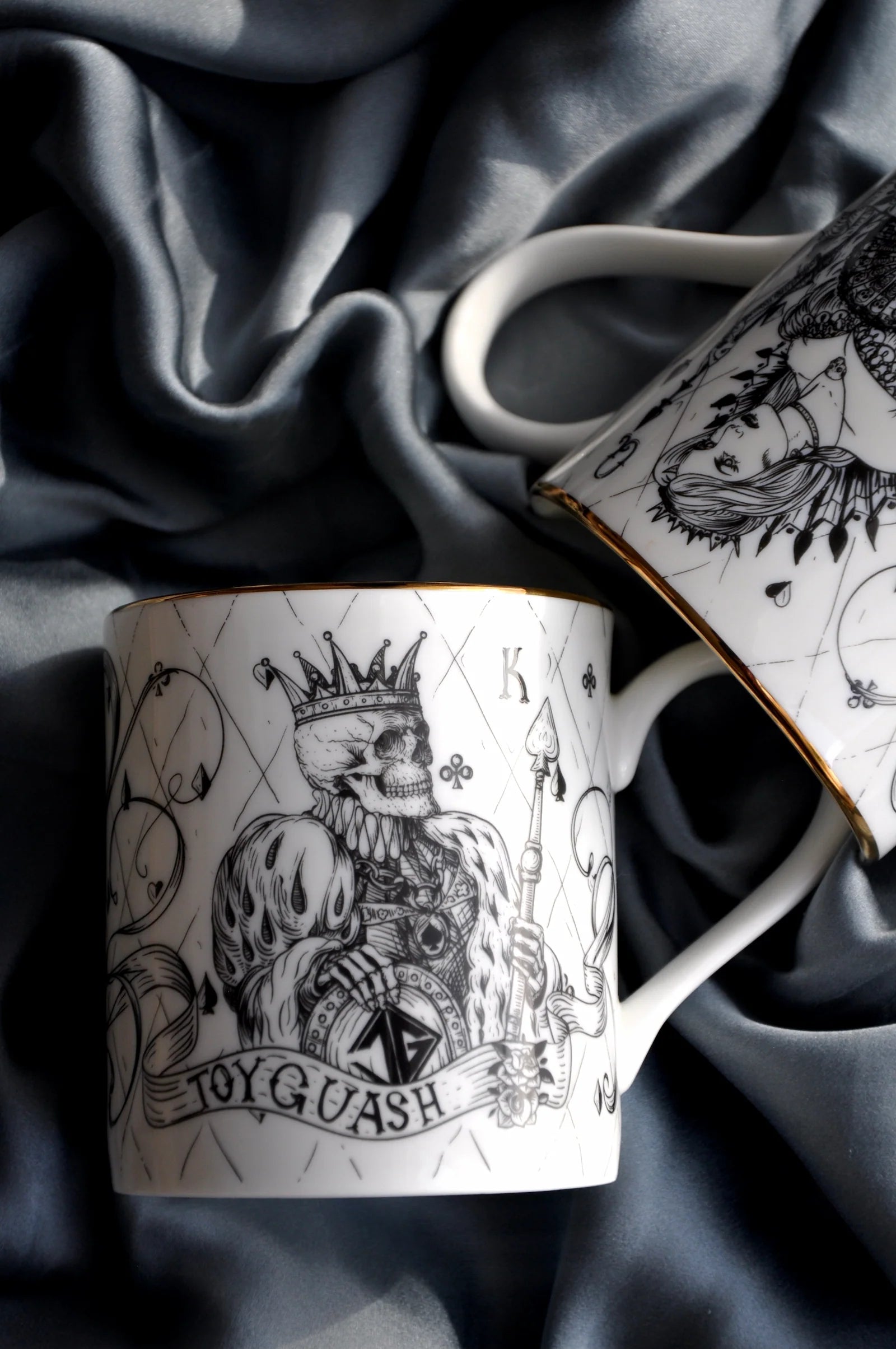 Two illustrated fine bone china mugs displayed together as a wedding or anniversary gift set