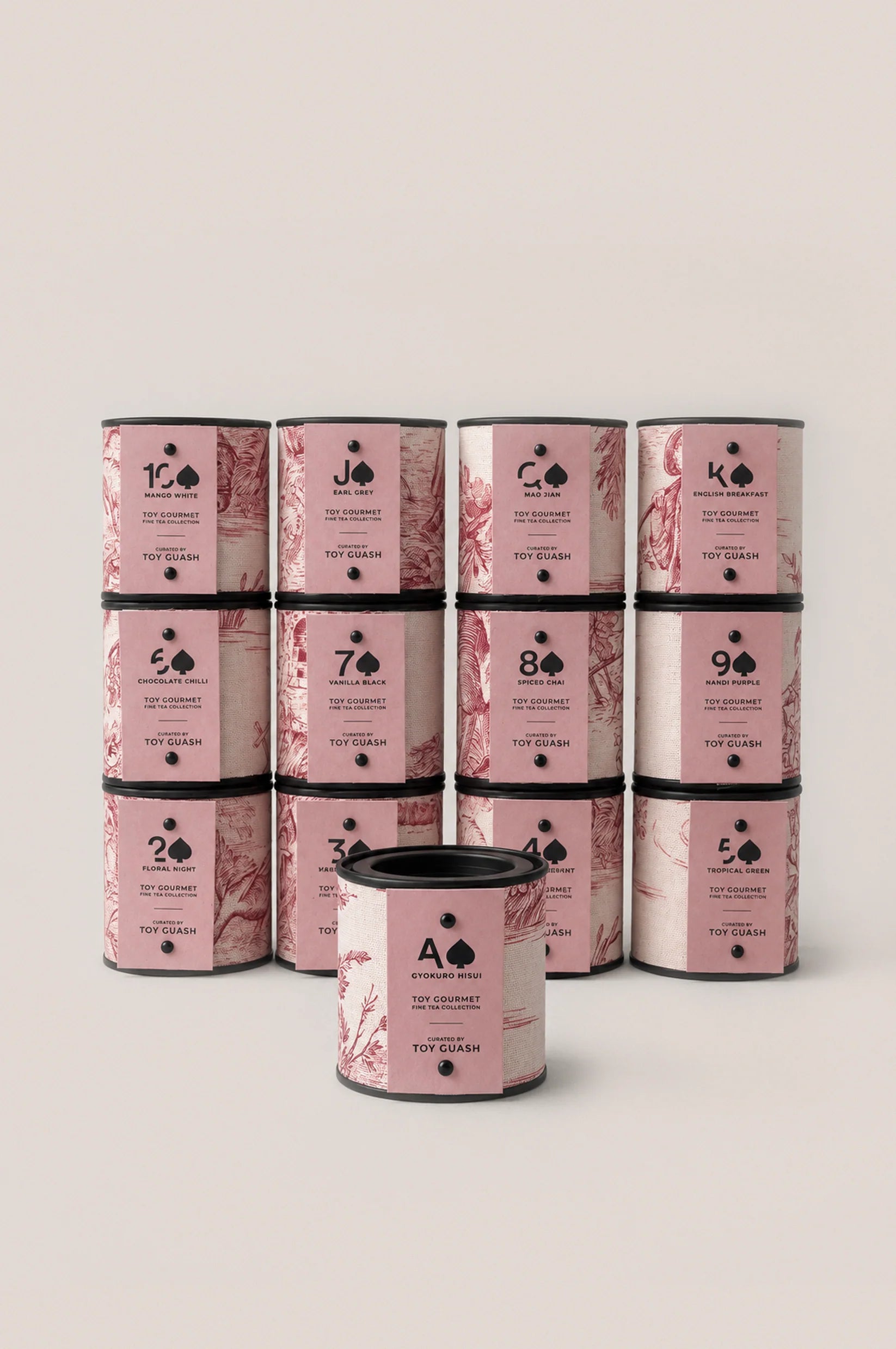 Thirteen loose leaf tea tins from the Toy Gourmet tea tasting collection, featuring a selection of signature blends