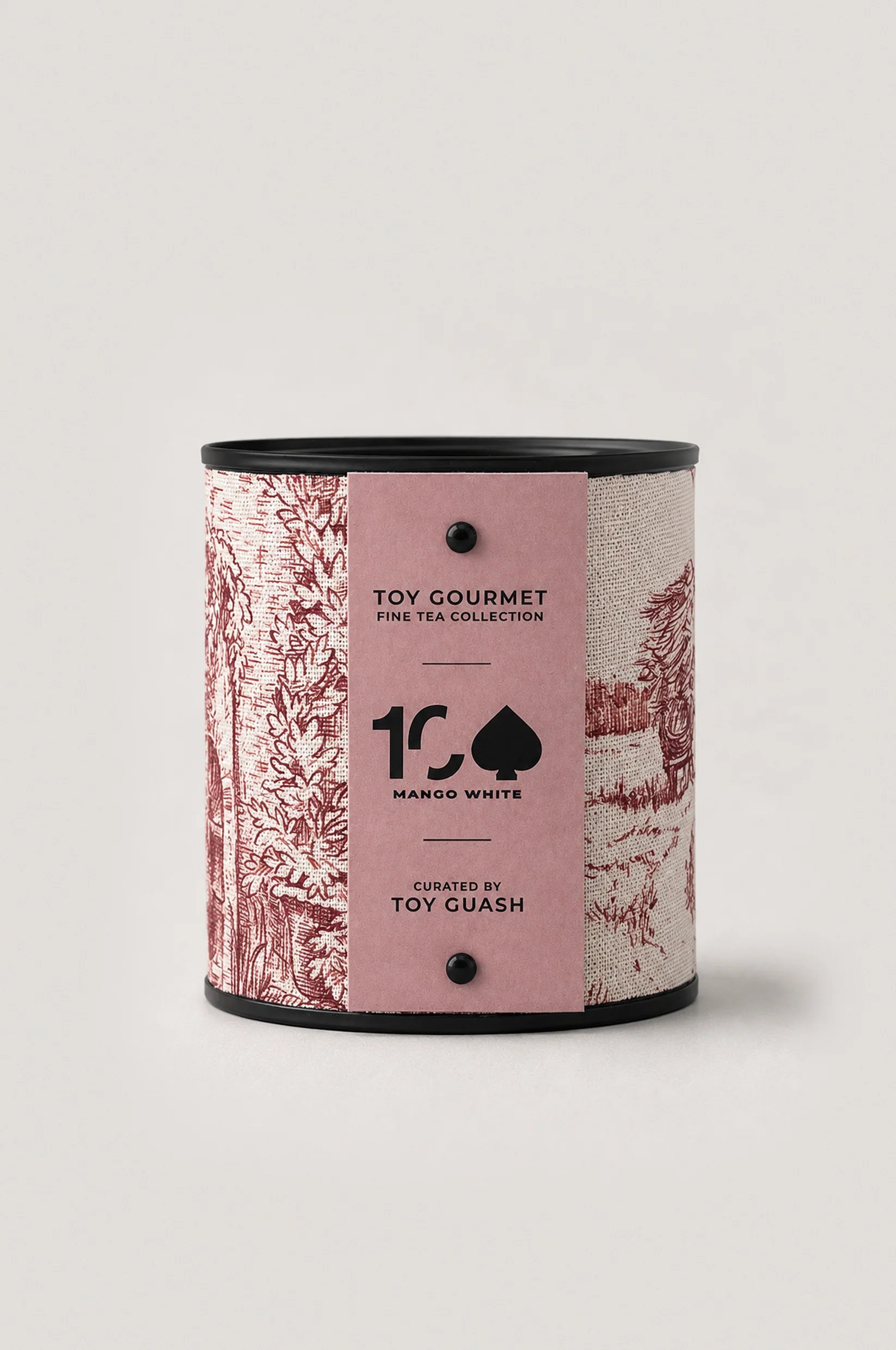 White tea with mango, loose leaf in fabric-wrapped tin, pale gold liquor, luxury tea by Toy Gourmet