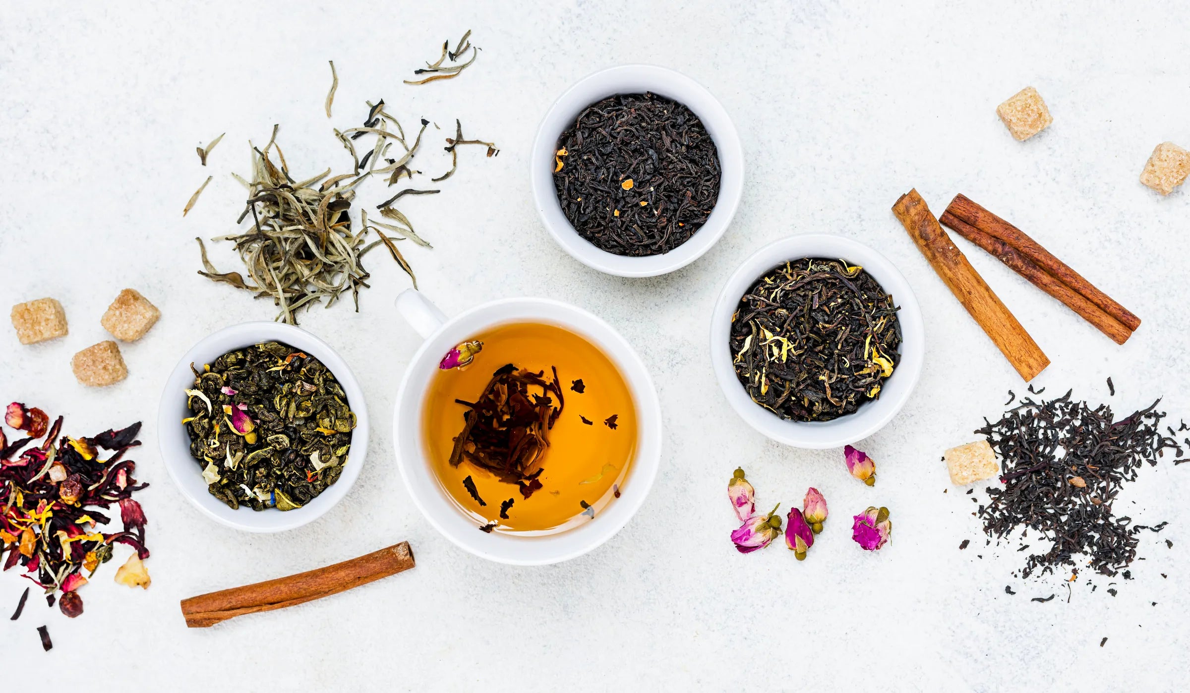 Premium loose leaf tea selection featuring black, green, white, purple and herbal teas.